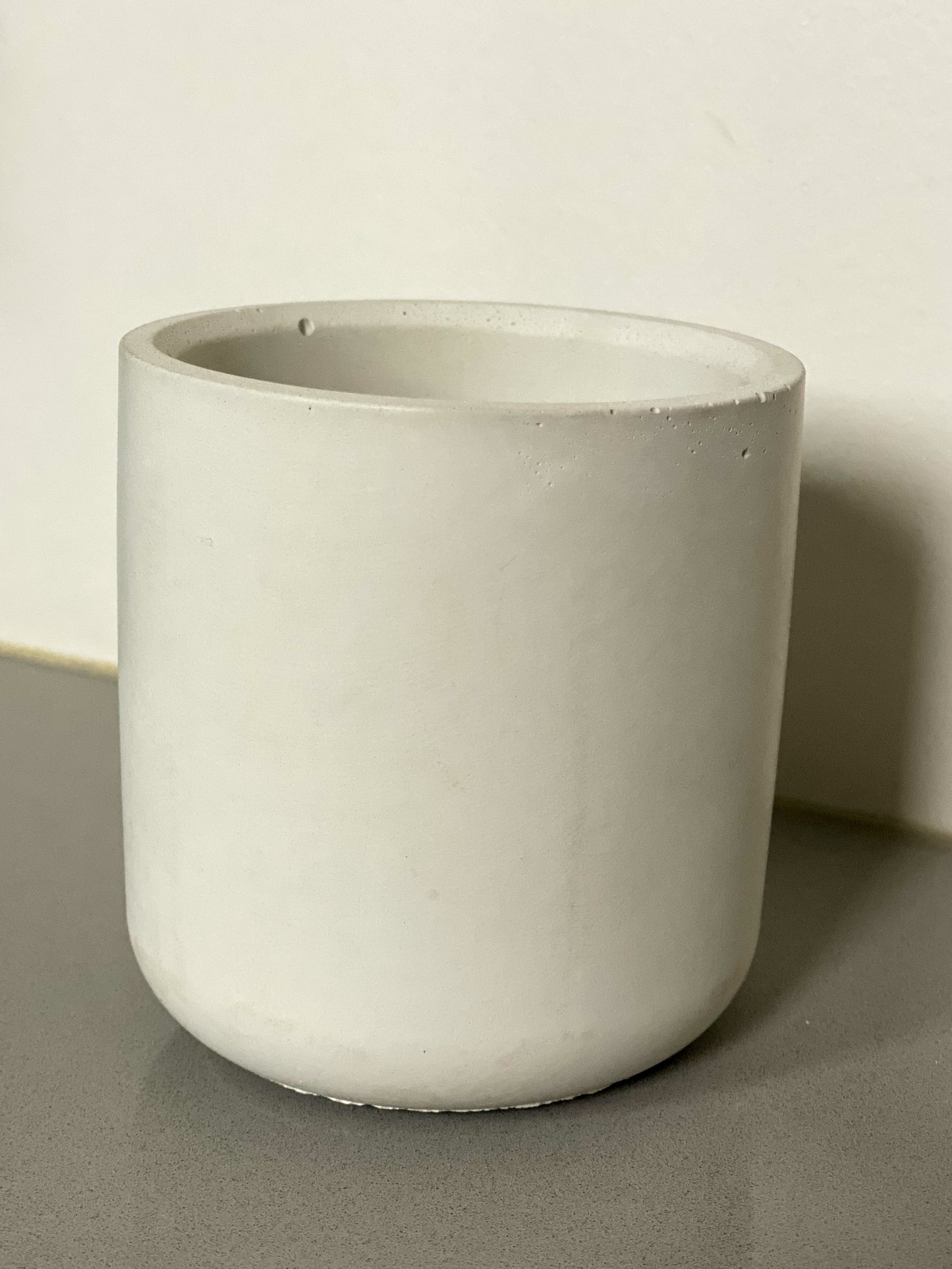 Small handcrafted concrete cylinder pot