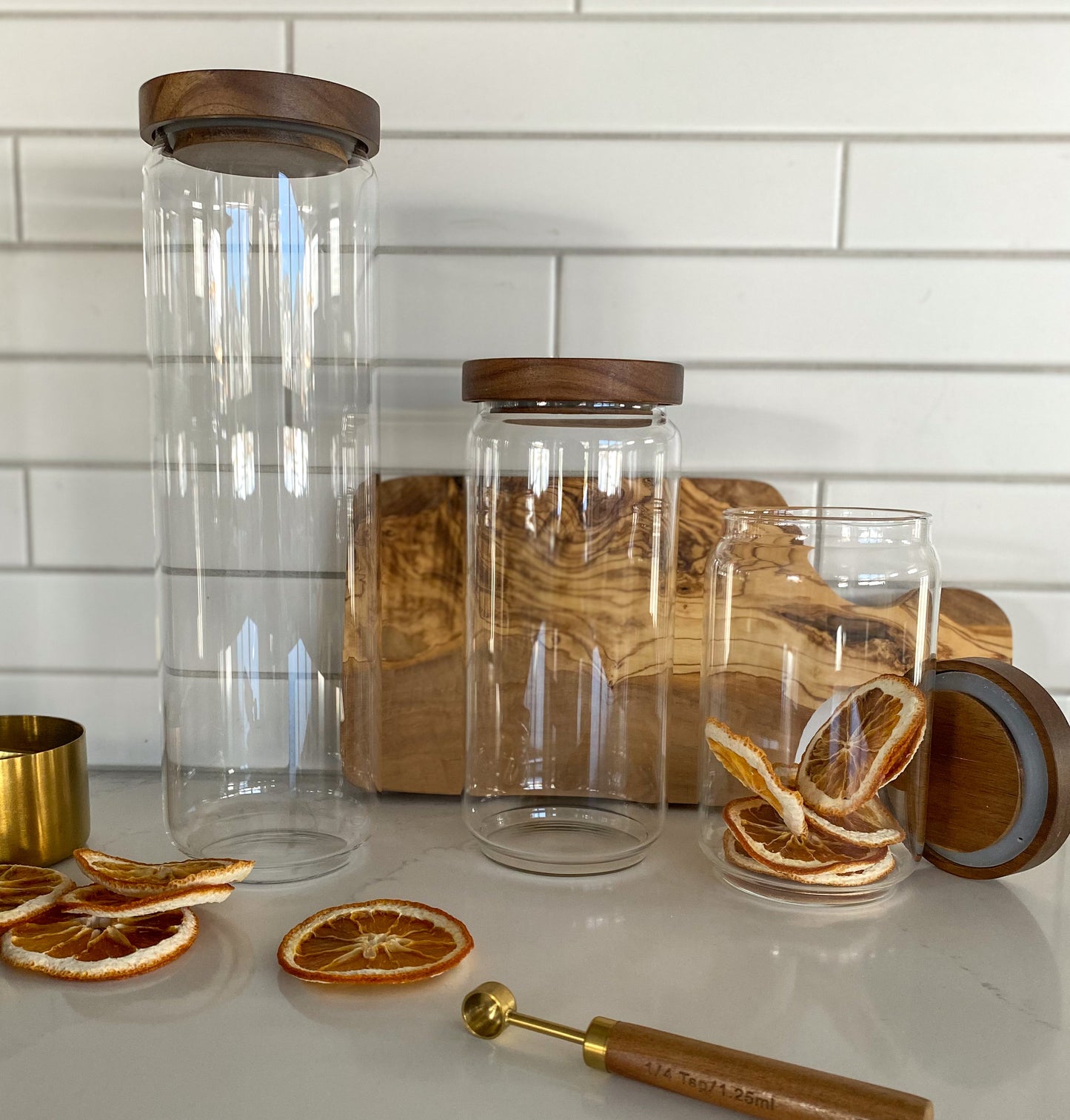 Glass storage canisters with acacia wood lids