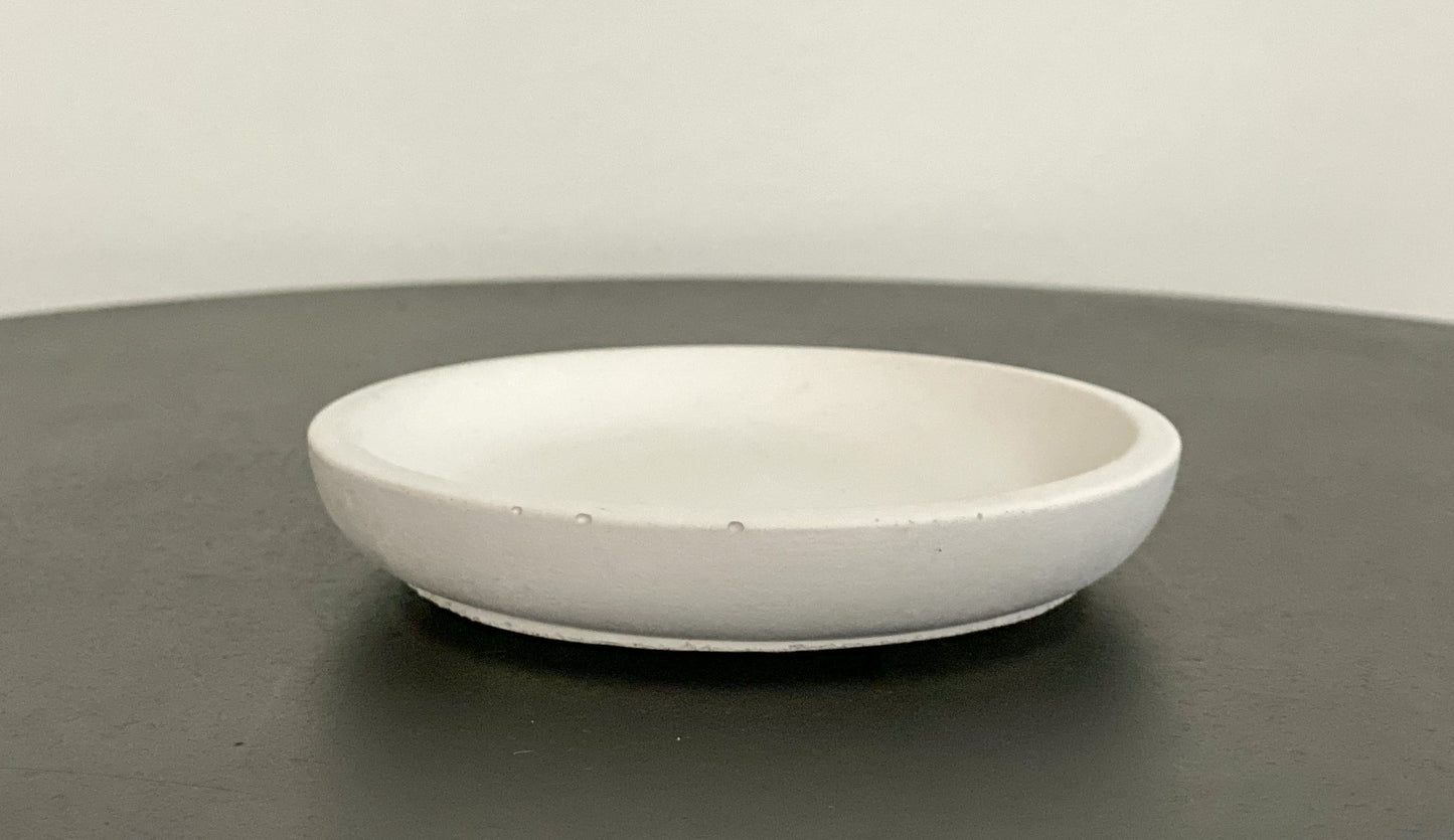 Small round concrete dish