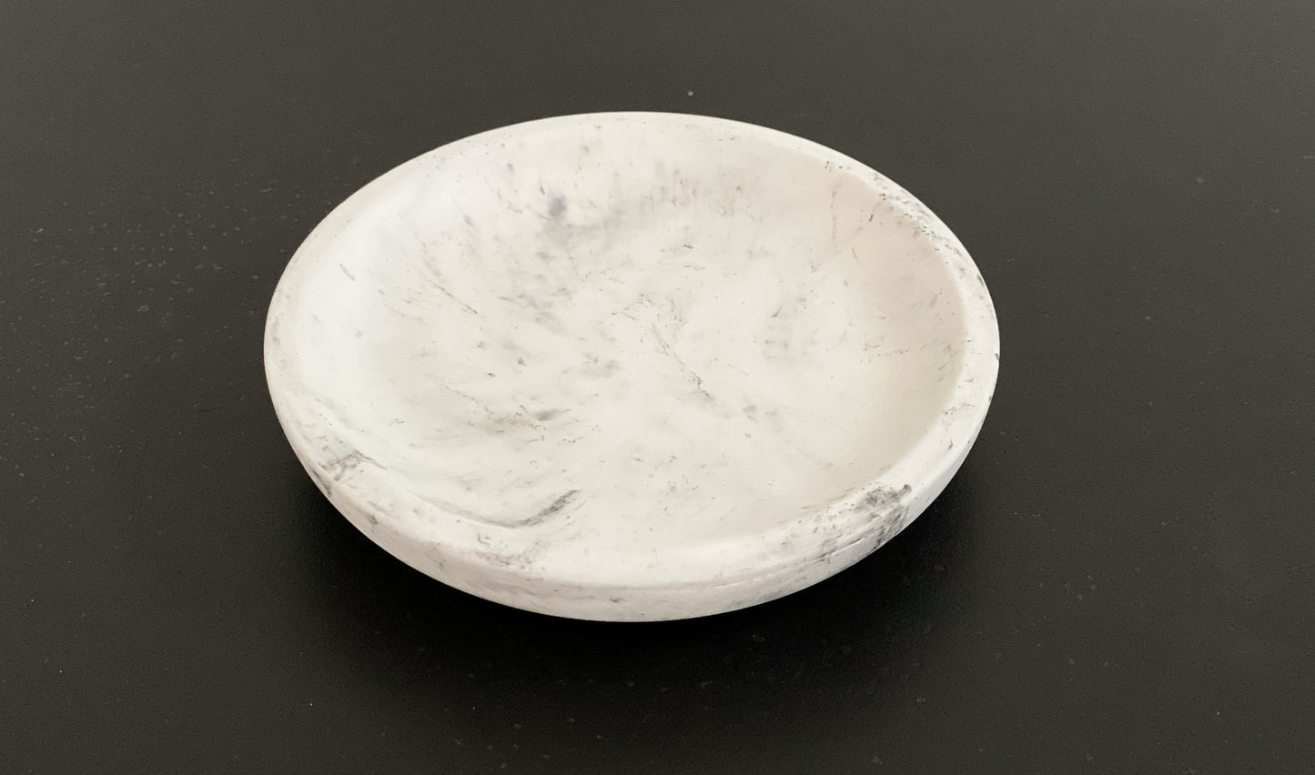 Small round concrete dish